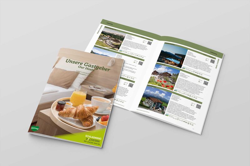Gastgeberverzeichnis Schladming-Dachstein: Cover und aufgeschlagene Inseratseiten